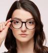 Black Glasses Direct Joe Round Glasses - Modelled by a female