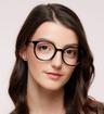 Black Glasses Direct Julia Round Glasses - Modelled by a female