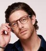 Crystal Brown London Retro Joel Round Glasses - Modelled by a male