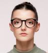 Black Polaroid PLD D496 Round Glasses - Modelled by a female