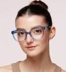 Crystal Blue Horn Scout Jade Oval Glasses - Modelled by a female