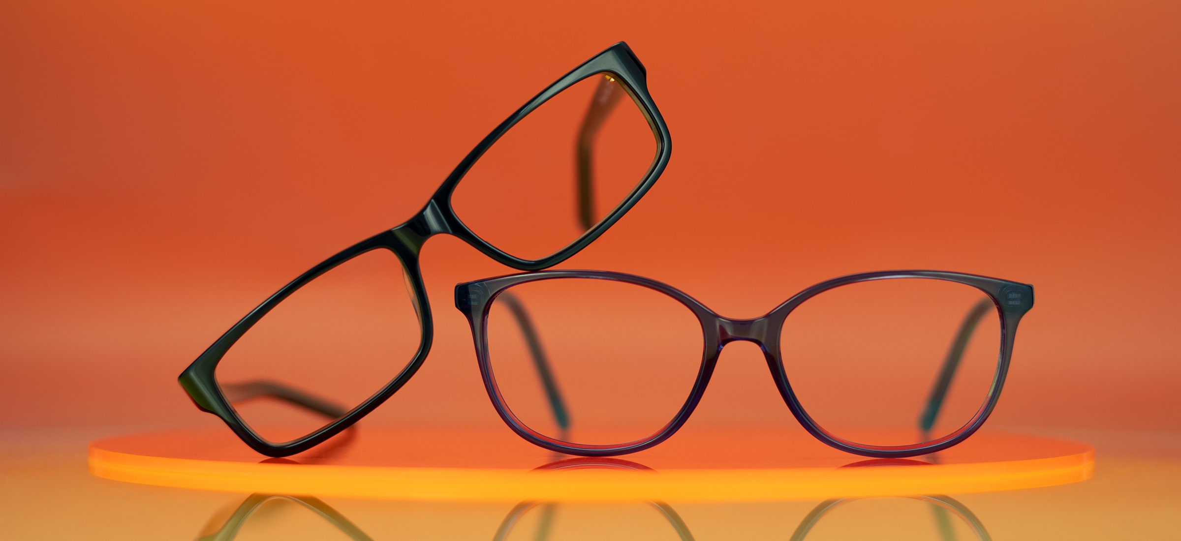 The Collection Howard glasses in black and Alora glasses in blue