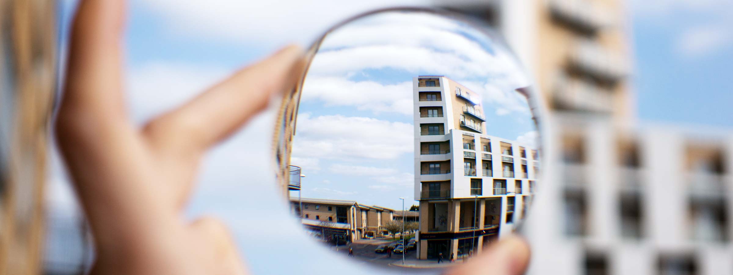 A lens bringing a building into focus