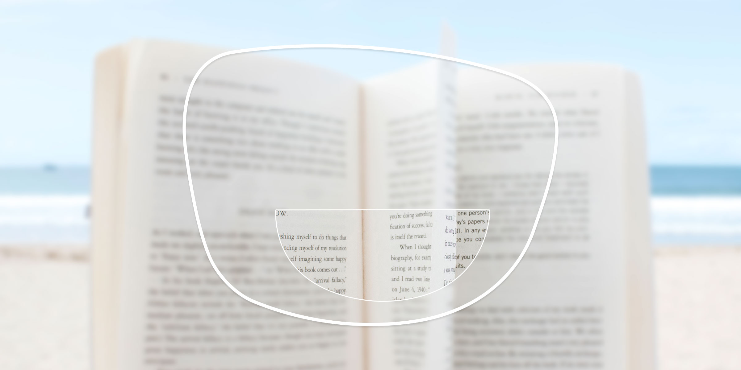 A book viewed through a bifocal lens, with only the reading segment in focus