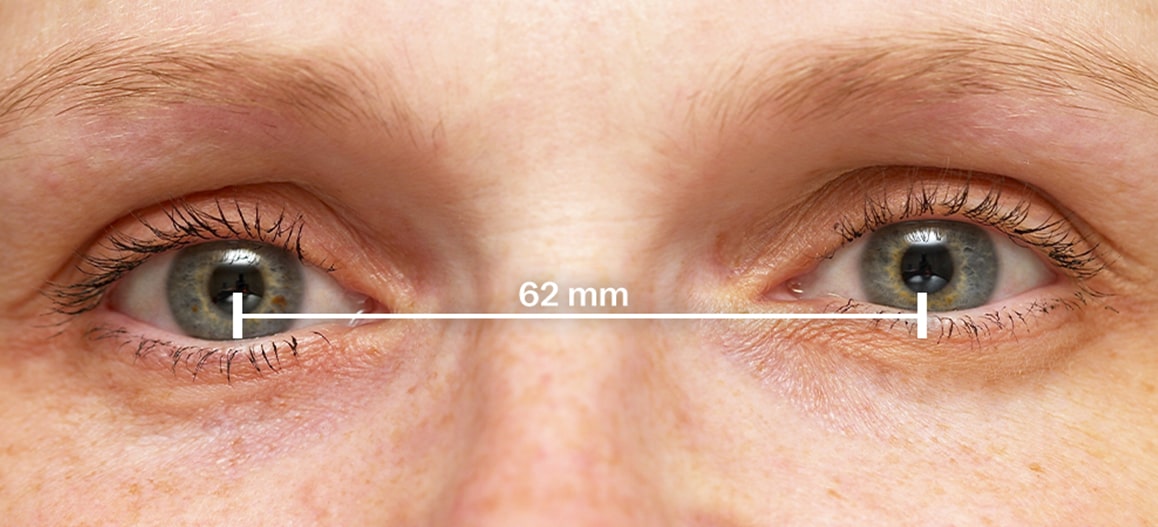 A woman's eyes with a line denoting a PD of 62mm