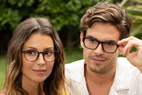 Woman and man wearing glasses