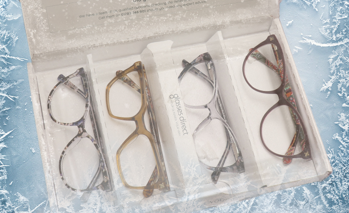 Four glasses frames in a Glasses Direct Home Trial box surrounded by ice flowers