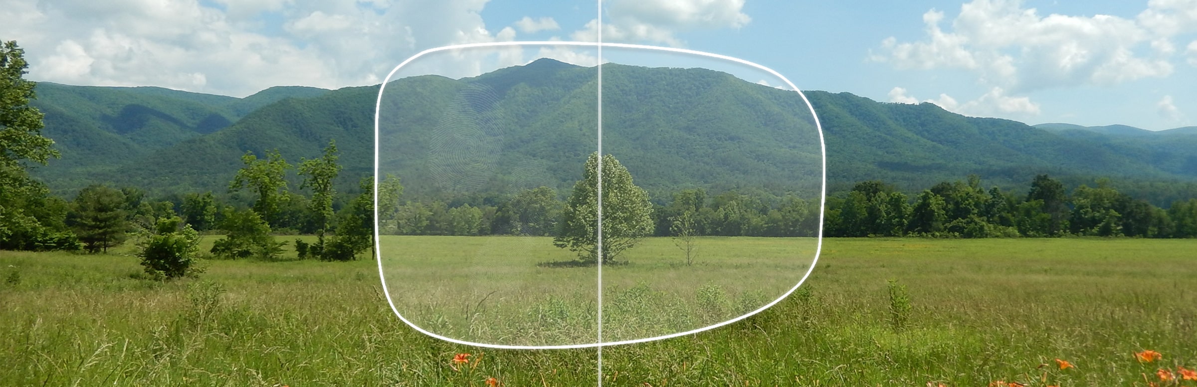 View of a field through a lens with and without an oleophobic coating