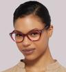 Crystal Dark Pink Aspire Gigi Cat-eye Glasses - Modelled by a female