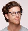 Gloss Navy Horn CAT 3505 Rectangle Glasses - Modelled by a male