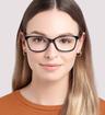 Shiny Black Glasses Direct Dottie Rectangle Glasses - Modelled by a female