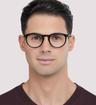 Black Gucci GG0121O Round Glasses - Modelled by a male