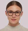 Tortoise LE COQ SPORTIF LCS2010 Rectangle Glasses - Modelled by a female