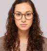 Shiny Brown Horn London Retro Dalston Round Glasses - Modelled by a female