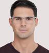 Grey / Grey Transparent Puma PE0104O Rectangle Glasses - Modelled by a male
