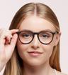 Black Ray-Ban RB7046-51 Round Glasses - Modelled by a female