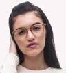 Transparent Brown Ray-Ban RB7046-51 Round Glasses - Modelled by a female