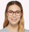 Transparent Brown Ray-Ban RB7211 Oval Glasses - Modelled by a female
