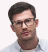 Transparent Grey Ray-Ban RB7217-52 Rectangle Glasses - Modelled by a male
