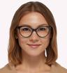 Teal Ted Baker Loree Round Glasses - Modelled by a female