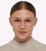 Pink Tommy Jeans TJ0011 Round Glasses - Modelled by a female