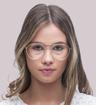 Gold Tommy Jeans TJ0088 Oval Glasses - Modelled by a female